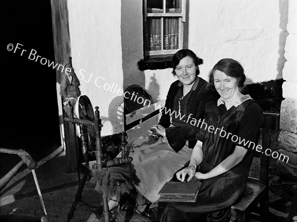 IN A COTTAGE HOUSE NEAR DRUMSHANBO WHERE THERE WAS HOME SPINNING  FR.CONEFREY & FR. GARAHY